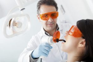 Dentist fixing a cavity